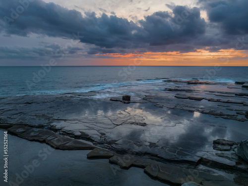 Sunrise over the sea and rocky Inlet