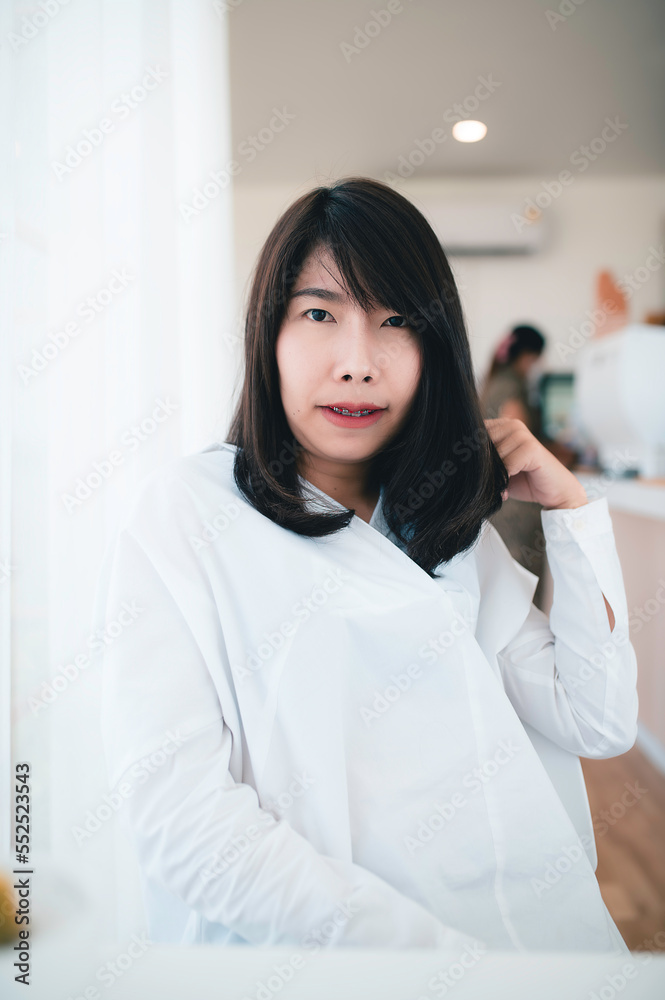 Portrait of Young beautiful asian woman in the coffee shop