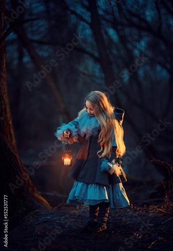 Obraz na płótnie Girl with candle in the night forest w salonie