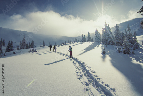 Ski mountaineering landscape photo. Beautiful nature scenery photography with snowy wilderness on background. Idyllic scene. High quality picture for wallpaper, travel blog, magazine, article