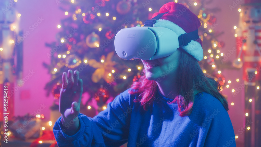 Virtual reality headset for a girl in Christmas house