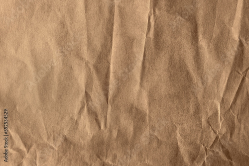 Creased Craft light brown color recyclable organic paper bag texture background photo