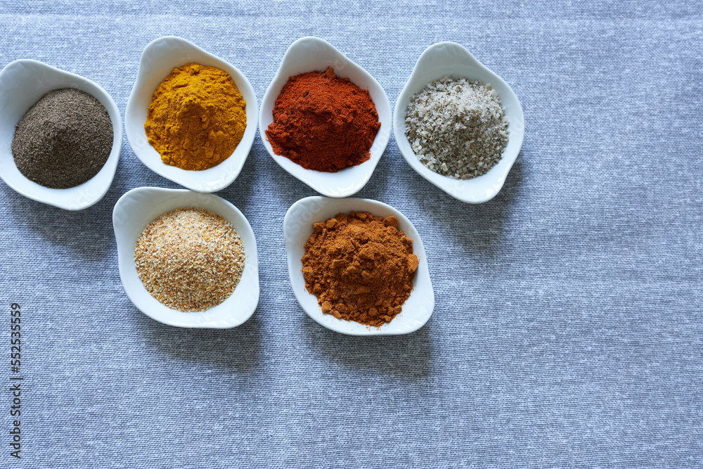 Spices close-up on a gray background. Spices close-up on a gray background.