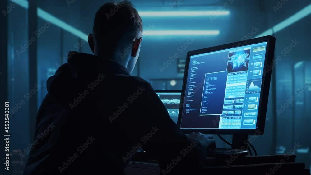 Computer Hacker in Hoodie. Obscured Dark Face. Hacker Attack, Virus Infected Software, Dark Web and Cyber Security concept