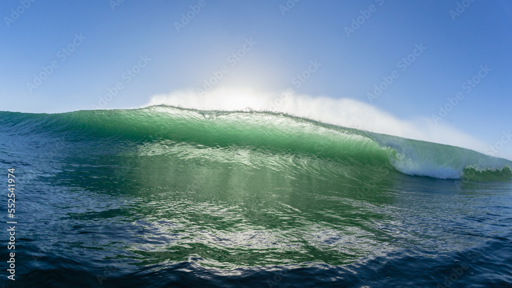 Fototapeta premium Wave Ocean Swimming Encounter Front View Face To Face Backlit Wall Water Crashing Breaking Photograph.
