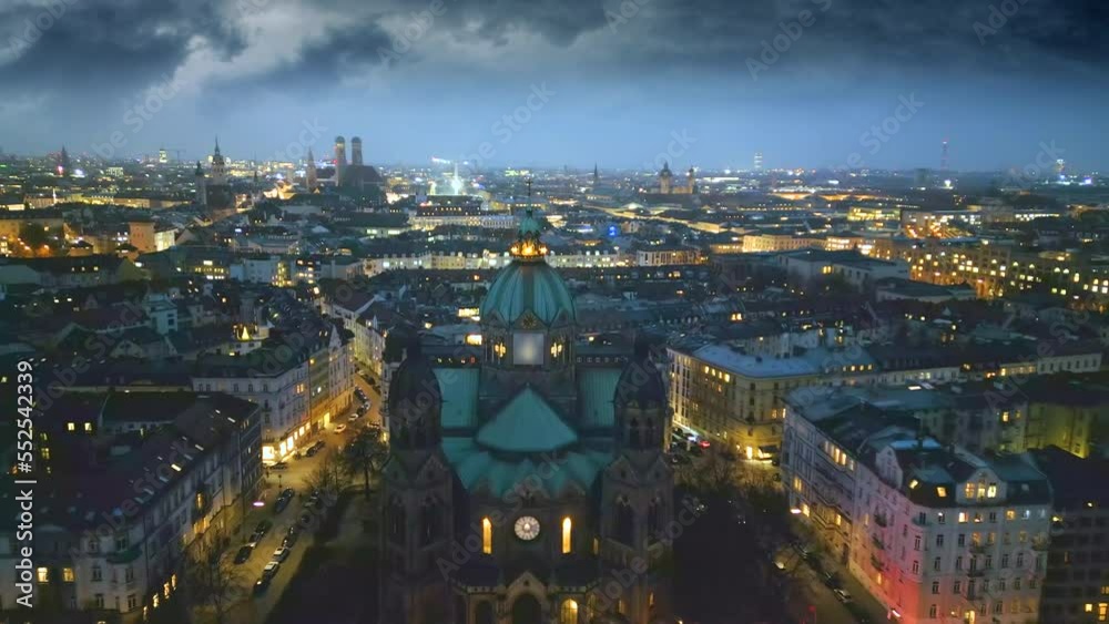 Munich skyline aerial view at night, munchen night view drone footage germany city, view of frauenkirche church cathedral, marienplatz downtown night view. Munich skyline aerial view at night, munchen night view drone footage germany city, view of frauenkirche church cathedral, marienplatz downtown night view.