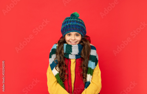 teen girl in scarf. portrait of child wearing warm clothes. express positive emotion.