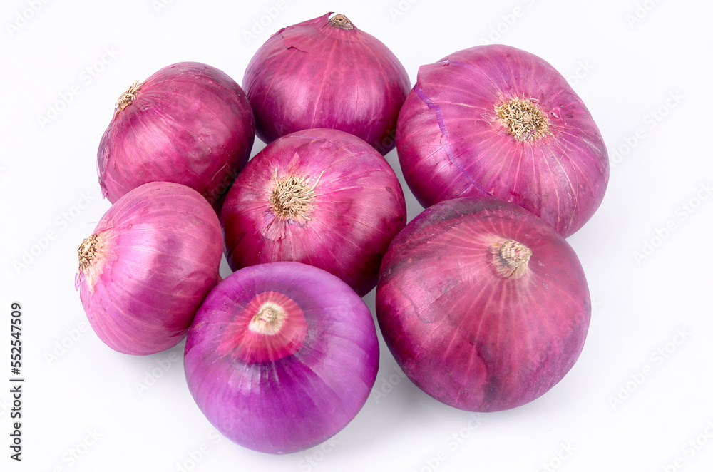 Group of Indian red whole onions isolated on white background