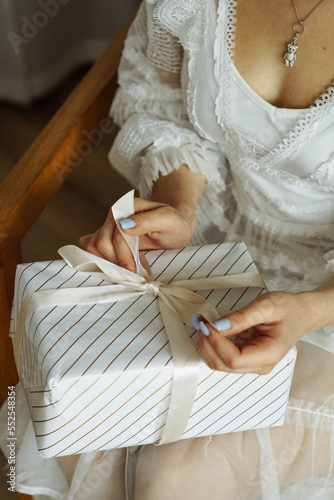 girl holding christmas gift