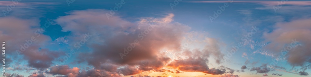 Dark blue sunset sky panorama with pink Cumulus clouds. Seamless