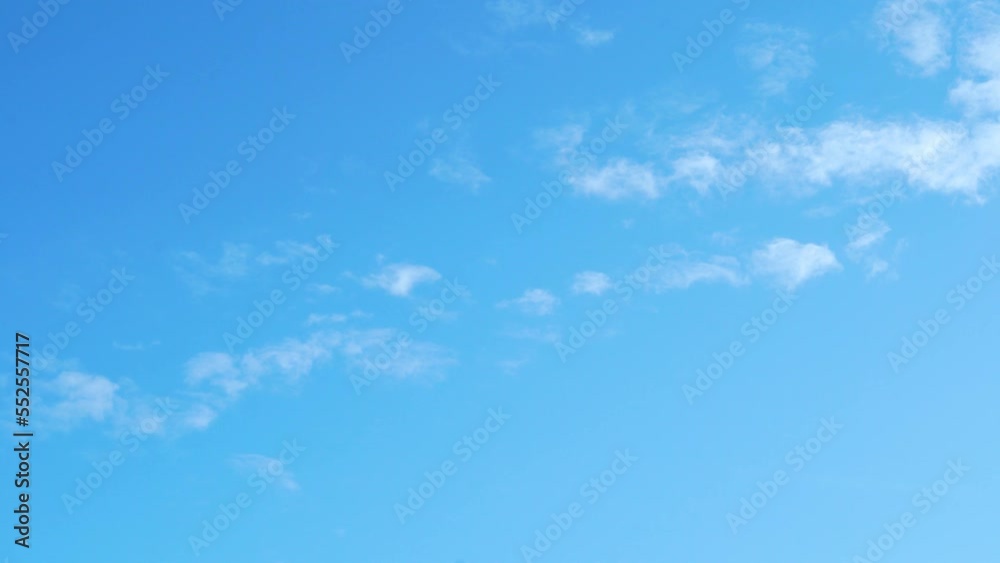 Sunny Clear Pure Blue Azure Cloudy Skyscrapers, Time lapse. Some Fluffy Floating Clouds in the Clear Azure Sky on a Sunny Day, Time Lapse. Background, Atmosphere, Climate, Meteorology. Sunny Clear Pure Blue Azure Cloudy Skyscrapers, Time lapse. Some Fluffy Floating Clouds in the Clear Azure Sky on a Sunny Day, Time Lapse. Background, Atmosphere, Climate, Meteorology.