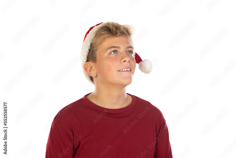 Christmas teen boy in Santa red hat isolated on white background Christmas teen boy in Santa red hat isolated on white background