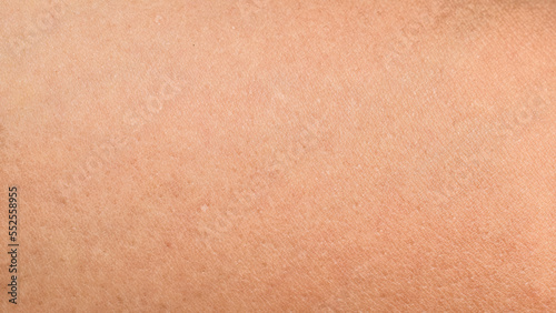 Abstract close-up human skin background texture.