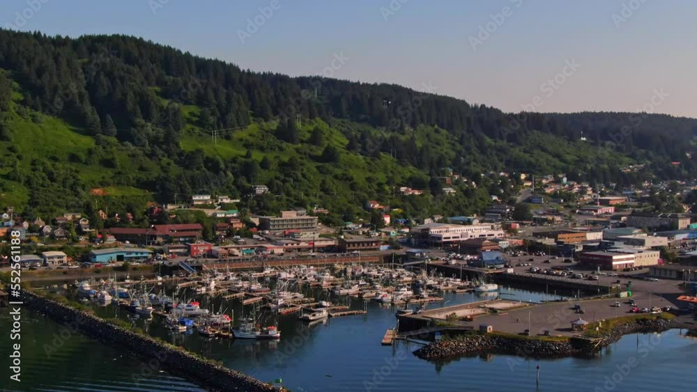 Juneau Port and Marina With Lush Green Mountain Hills And Waterfront Buildings In Juneau, Alaska. - aerial Juneau Port and Marina With Lush Green Mountain Hills And Waterfront Buildings In Juneau, Alaska. - aerial