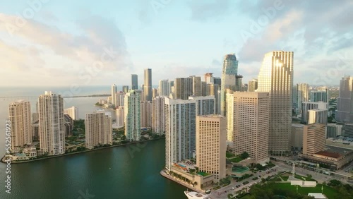 Wallpaper Mural Miami Brickell Downtown at sunrise. Beautiful modern skyscrapers reflecting golden sun rays in financial banking and business district. Aerial drone view. Miami River. America 4k cinematic footage Torontodigital.ca