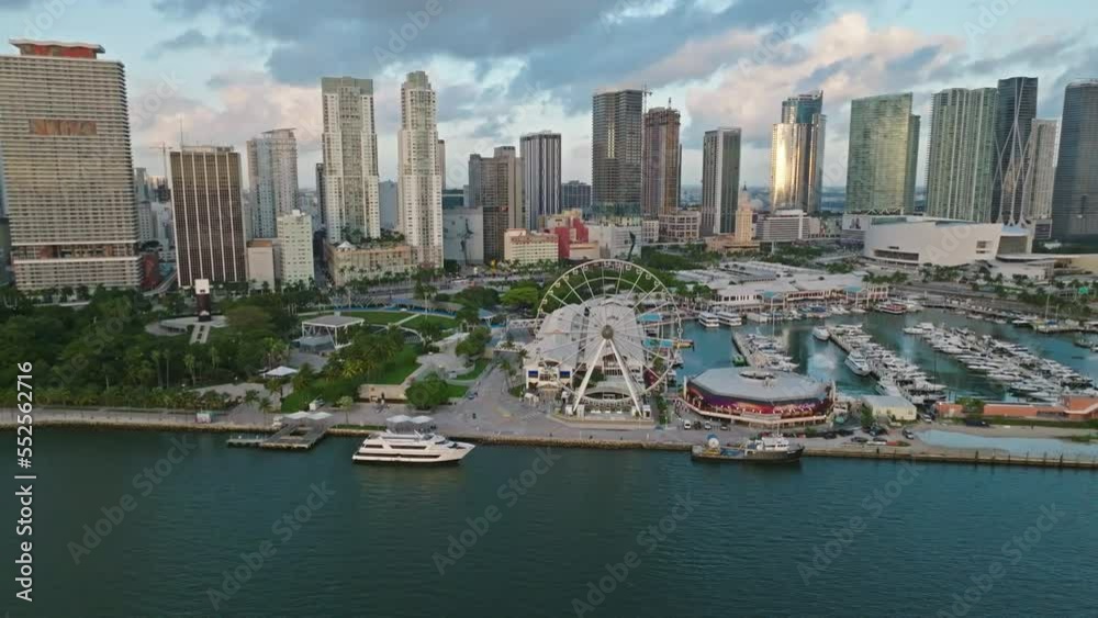 Bayside Marina and Marketplace near Bayfront Park. Aerial drone view. Miami landscape. Ferris wheel on the seashore Bayside Marina and Marketplace near Bayfront Park. Aerial drone view. Miami landscape. Ferris wheel on the seashore