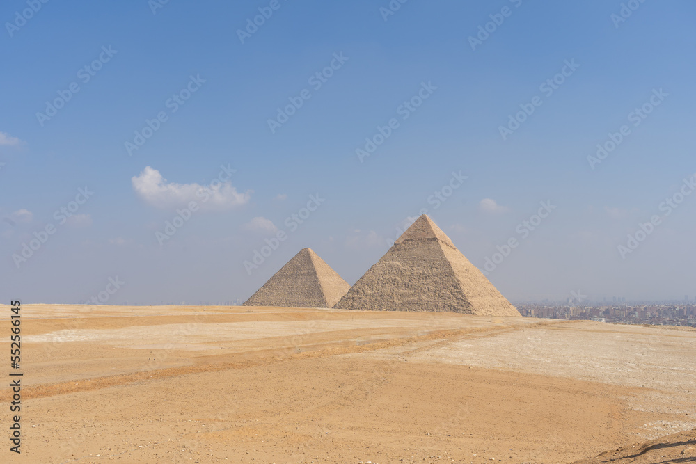panoramic view of the pyramids of Egypt and the city of Cairo in the background panoramic view of the pyramids of Egypt and the city of Cairo in the background