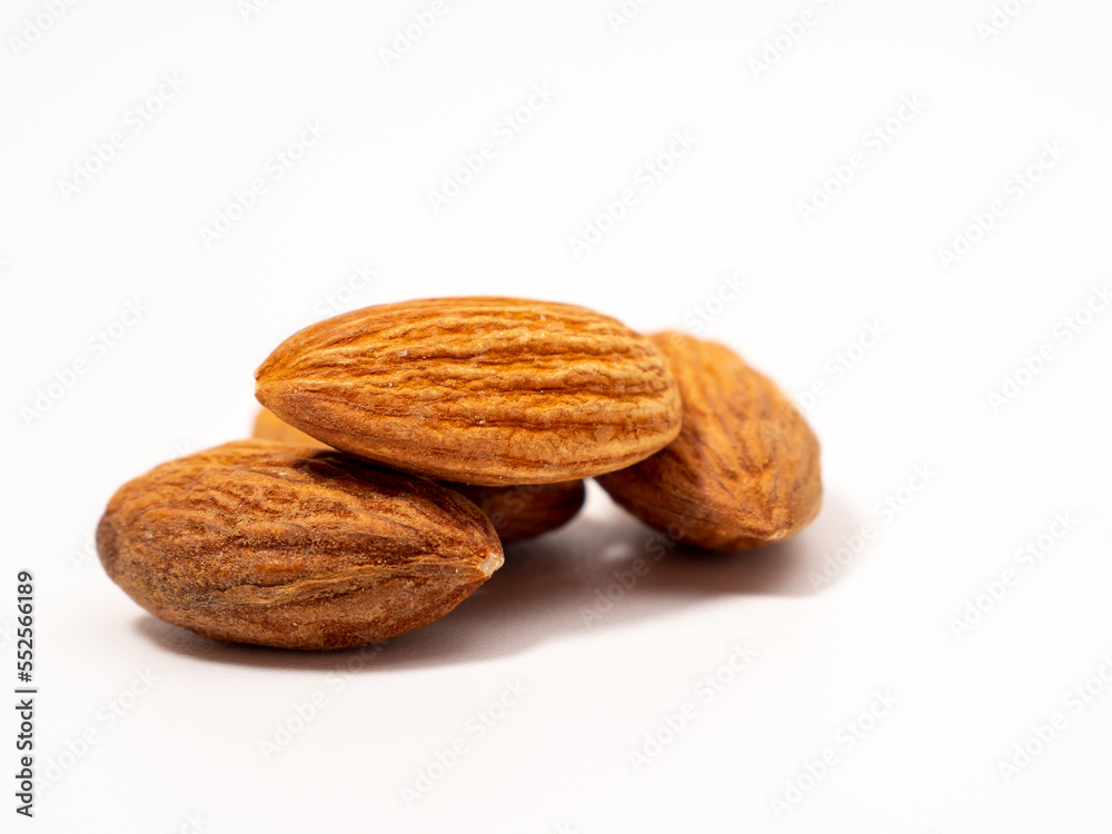 Almond on a white background. Raw almond.