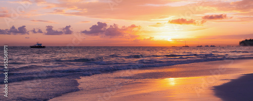 Panoramic coastal landscape with raising sun © evannovostro