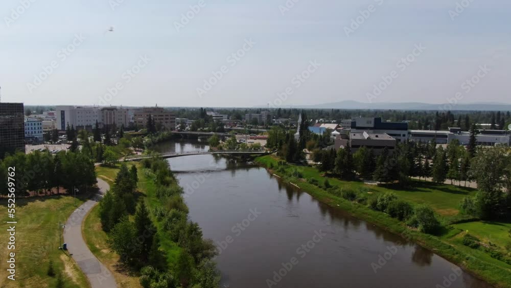 Aerial View Of Chena River Flowing Through Downtown Fairbanks In Alaska, USA In Early Autumn. Aerial View Of Chena River Flowing Through Downtown Fairbanks In Alaska, USA In Early Autumn.