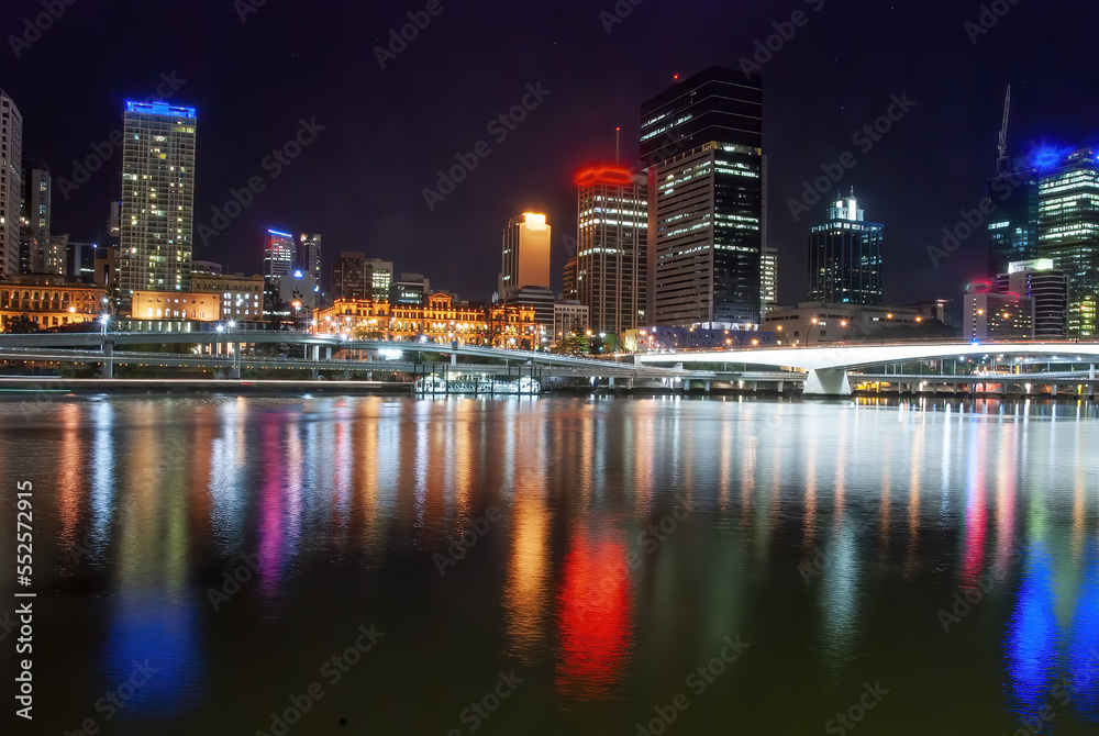 Fototapeta premium Brisbane night city view with skyscrapers reflections on city river - Australia