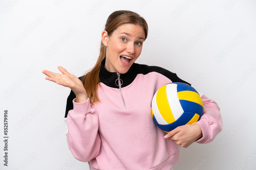 Young caucasian woman playing volleyball isolated on white background with shocked facial expression Young caucasian woman playing volleyball isolated on white background with shocked facial expression