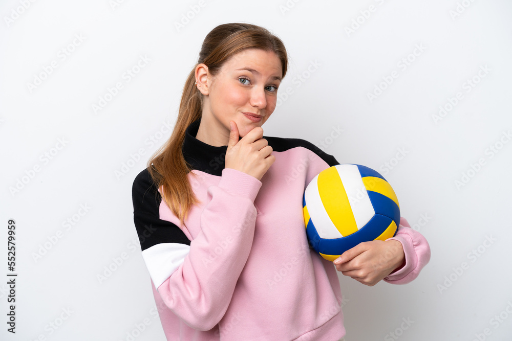 Young caucasian woman playing volleyball isolated on white background happy and smiling