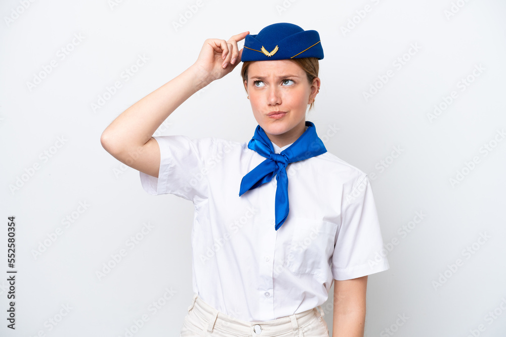 Airplane stewardess woman isolated on white background having doubts and with confuse face expression