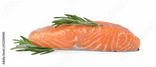 Piece of fresh raw salmon with rosemary isolated on white