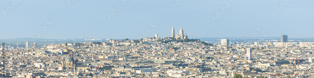 Paris skyline and panorama with the hill of Montmartre and the Sacred-Heart seen from the roof of the Arc de Triomphe