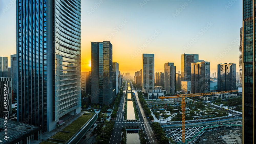 Aerial view of city skyline and modern buildings at sunrise in Ningbo, Zhejiang Province, China. East new town of Ningbo, It is the economic, cultural and commercial center of Ningbo City.