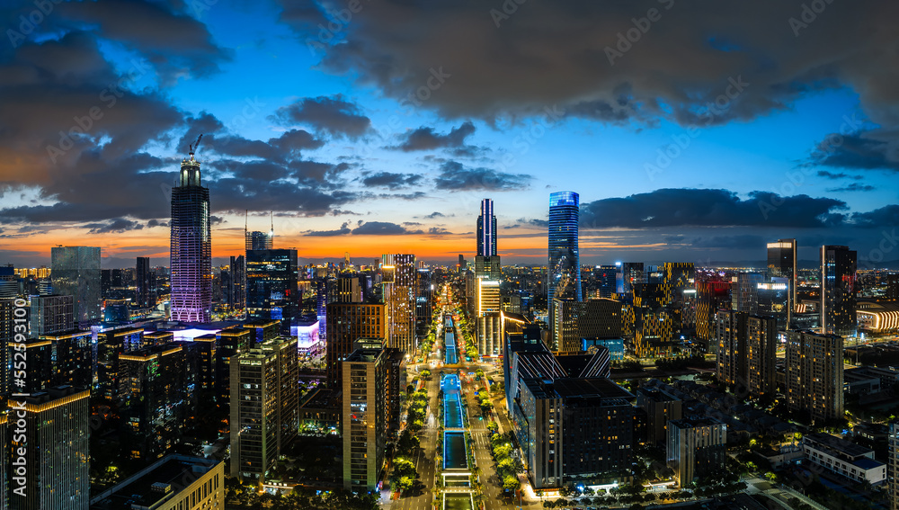 Aerial view of city skyline and modern buildings scenery in Ningbo at night, Zhejiang Province, China.