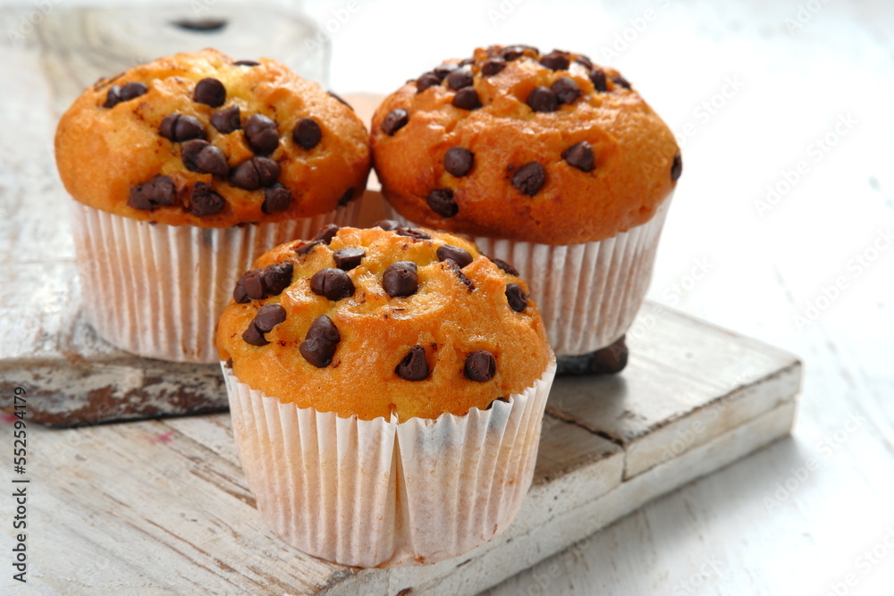 Chocolate chip muffins on white background Chocolate chip muffins on white background