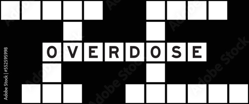 Alphabet letter in word overdose on crossword puzzle background