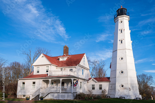 landmark north point lighthouse and Queen Anne style lightkeeper quarters off lake michigan lakefront in milwaukee photo