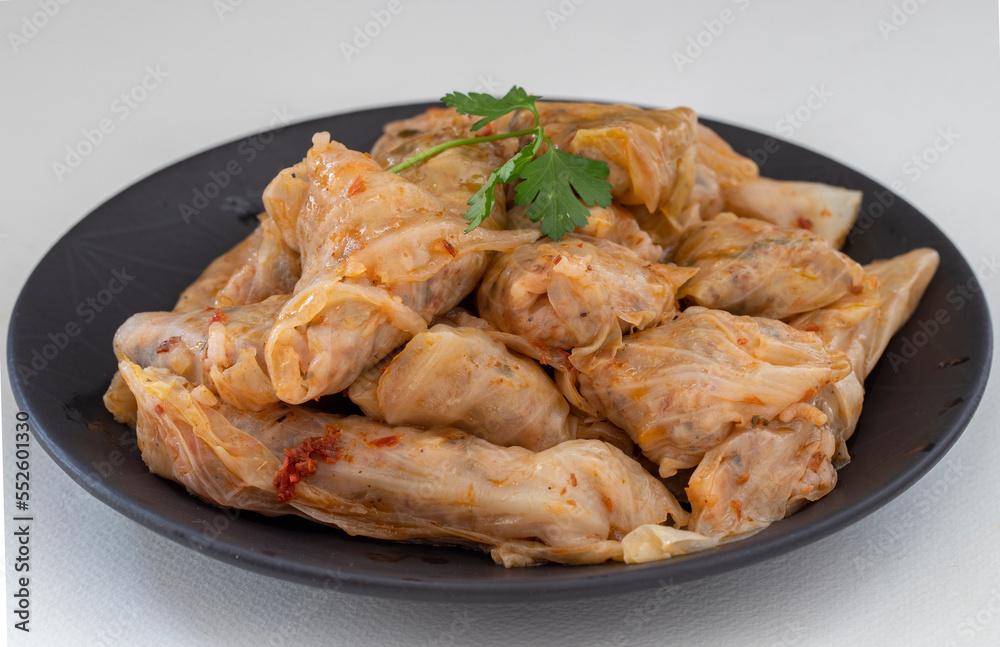 Lahana Sarma, Turkish traditional food,a boiled cabbage leaf that is formed into a roll with a stuffing of rice Lahana Sarma, Turkish traditional food,a boiled cabbage leaf that is formed into a roll with a stuffing of rice
