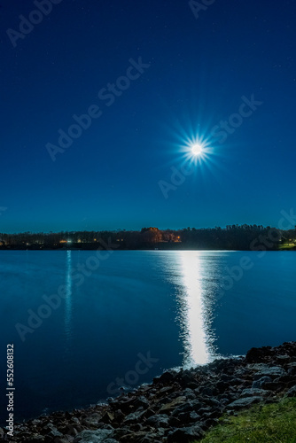 Full Moon burst over a lake