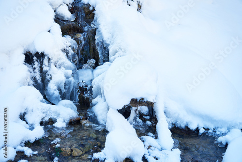 Mountain river in the winter forest.