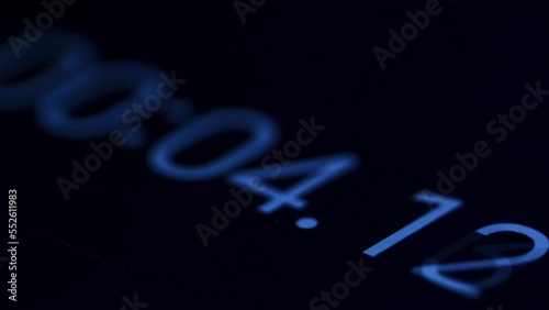 A man starting a stopwatch with his finger