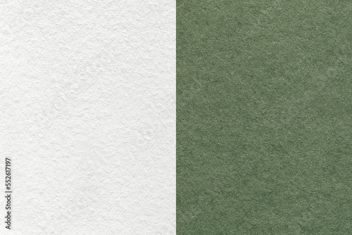 Texture of craft white and green paper background, half two colors, macro. Structure of vintage dense olive cardboard.