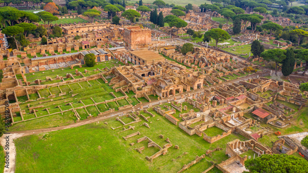 Aerial view on the Excavations road of Ostia Antica, a large archaeological site. These Roman ruins are located in the archaeological area of Ostia, near Rome, Italy. 