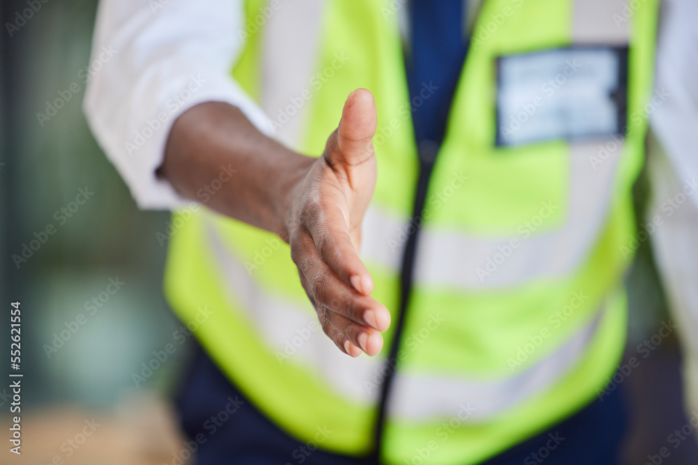 Fototapeta premium Black man, architect and handshake for b2b, partnership or meeting for introduction at the workplace. Hand of African American male employee engineer for agreement deal, greeting or welcome