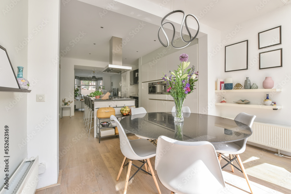 Modern Home With Furniture next to a kitchen Modern Home With Furniture next to a kitchen