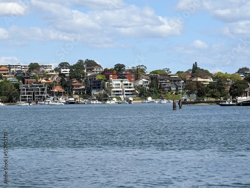 A view of harbourside houses in Fern Bay, Drummoyne, from Cockatoo Island, Sydney, NSW, Australia. photo