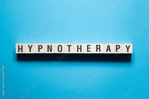 Hypnotherapy - word concept on cubes