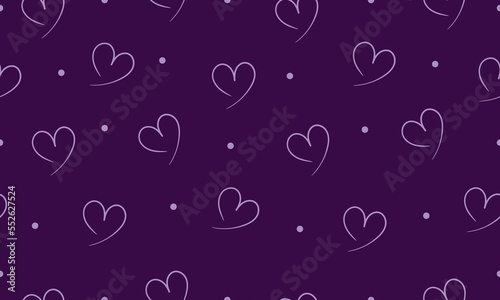 Seamless pattern of purple hearts and polka dots on a purple background