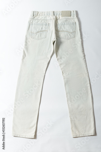 Back view of an Ice blue colored jeans on a white background.
