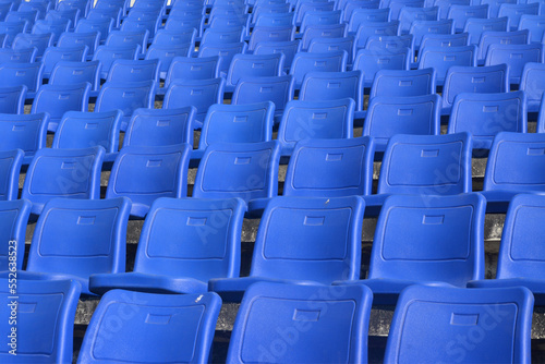blue chair on stadium.  To watch a sporting event.