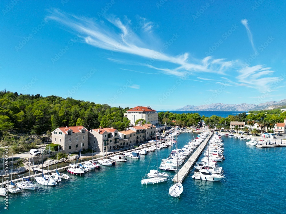 Boats moored Makarska  harbour Croatia Dalmatian coast drone aerial view ..