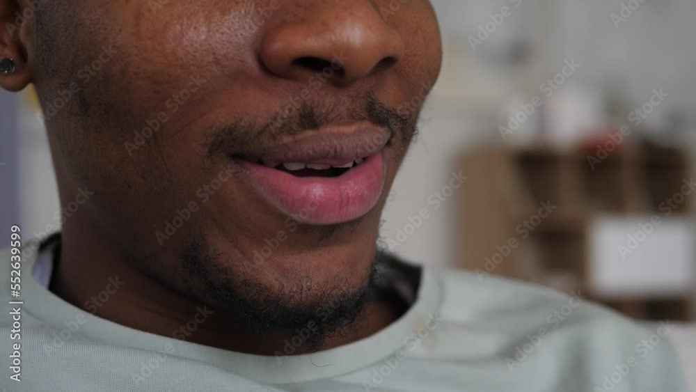 Beautiful smile of an African-American men talking to a friend.